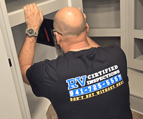 RV Tech Inspecting Plumbing