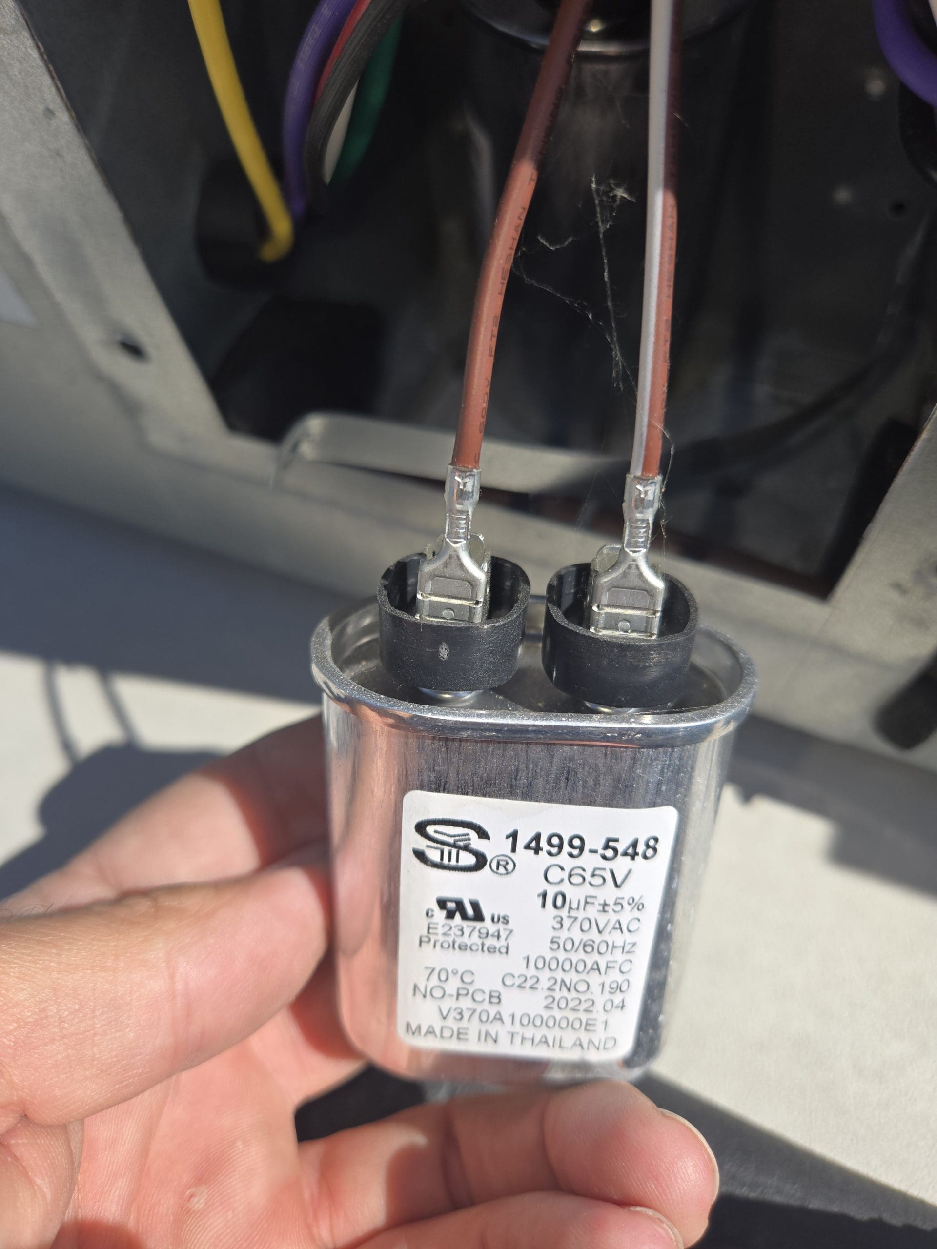Inspecting the AC Fan Capacitor